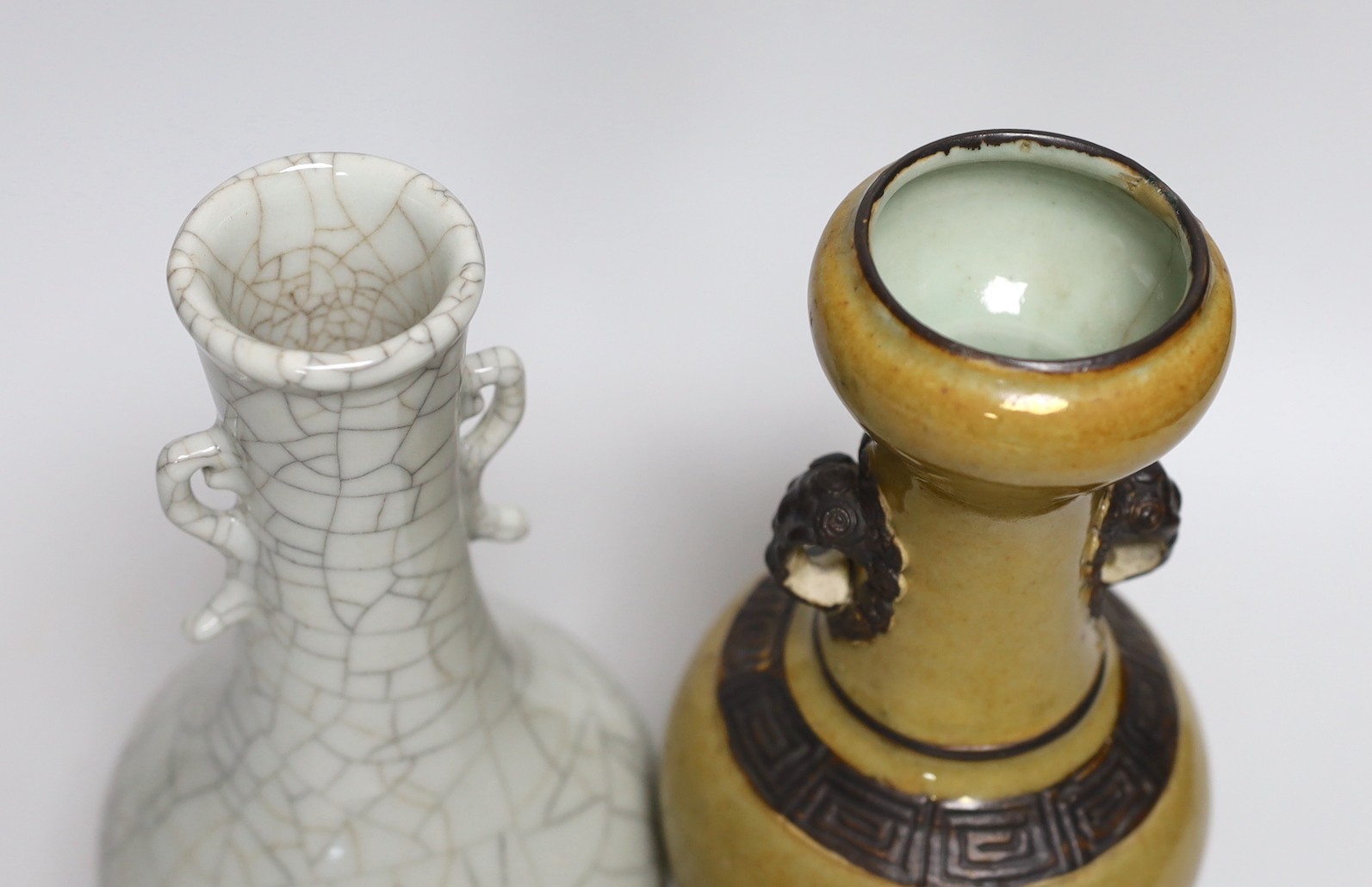 A Chinese crackle glaze vase, 24cms high and a pale brown glazed vase